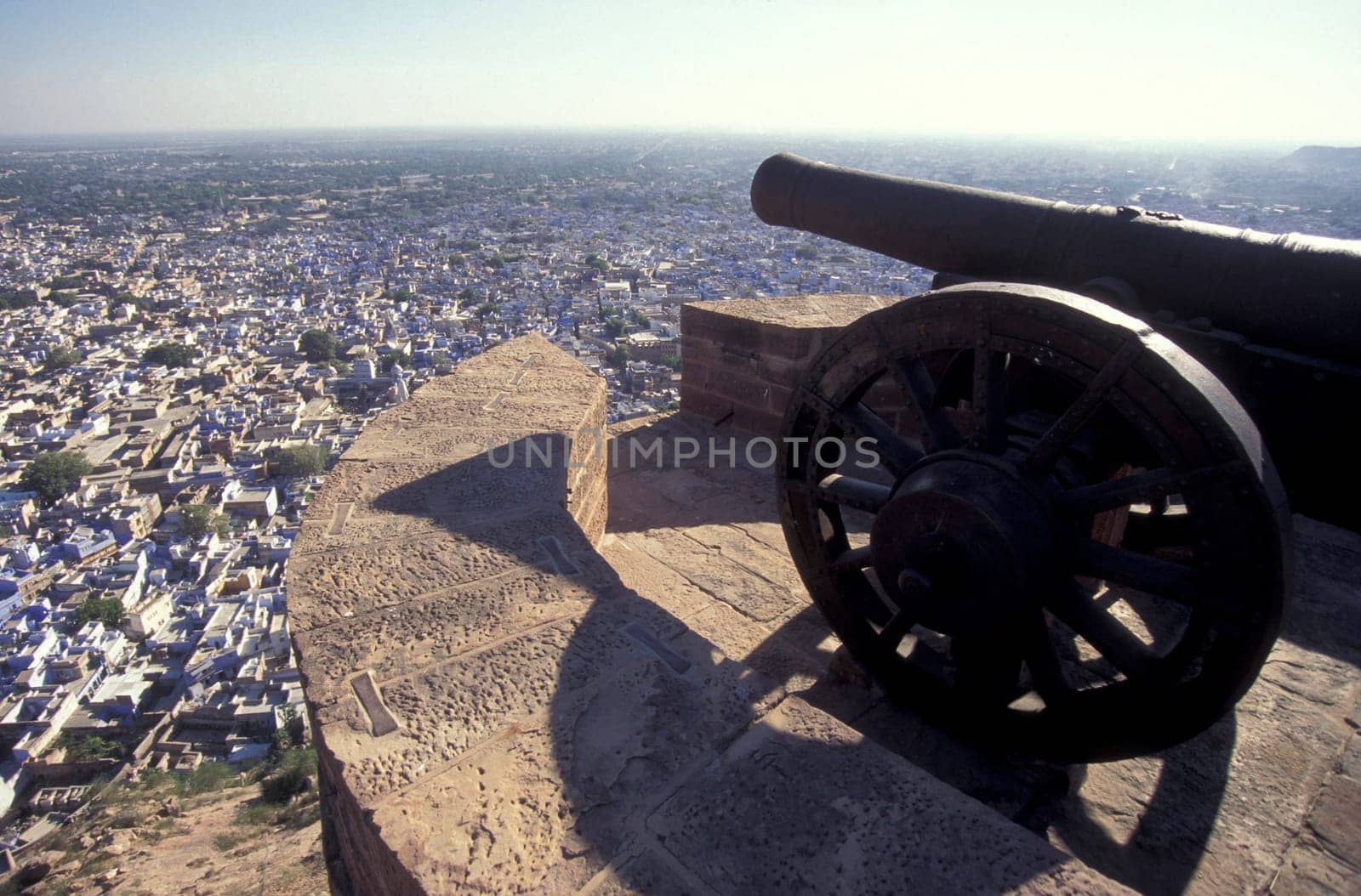 a view from the Meherangarh to the Town and Blue City of Jodhpur in the Province of Rajasthan in India.  India, Jodhpur, January, 1998