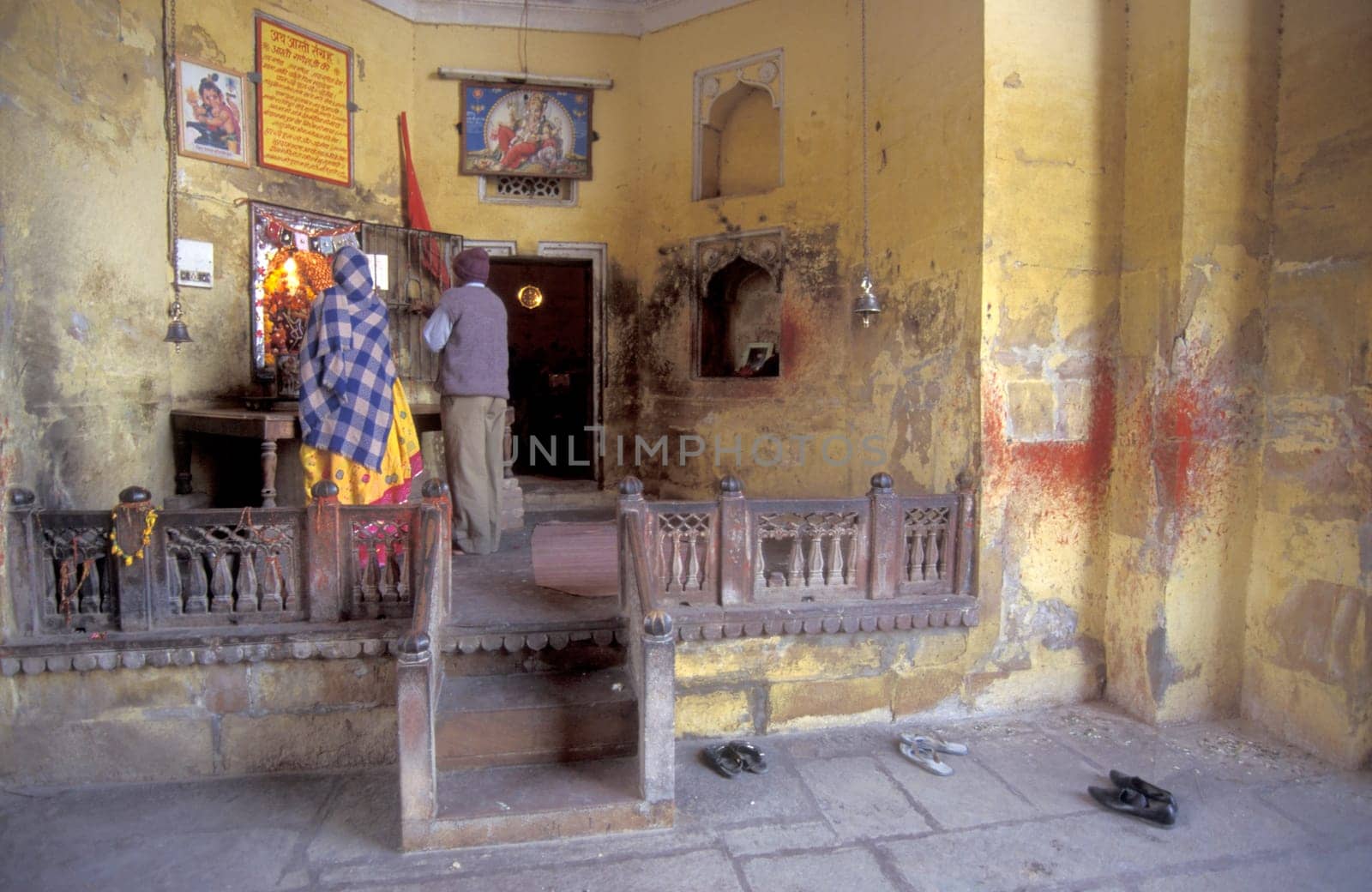 A shrine at the Women Queens Handprints of Sati and grid of Sculpted hands at the Meherangarh in the Town of Jodhpur in the Province of Rajasthan in India.  India, Jodhpur, January, 1998