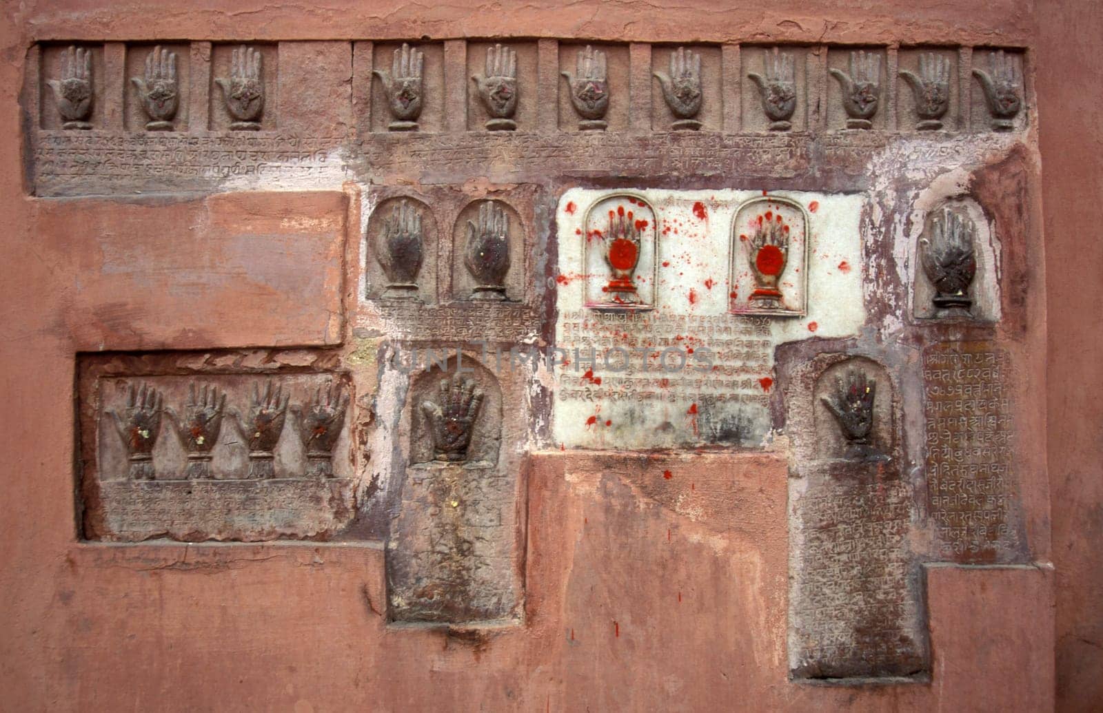 Women Queens Handprints of Sati and grid of Sculpted hands at the Meherangarh in the Town of Jodhpur in the Province of Rajasthan in India.  India, Jodhpur, January, 1998