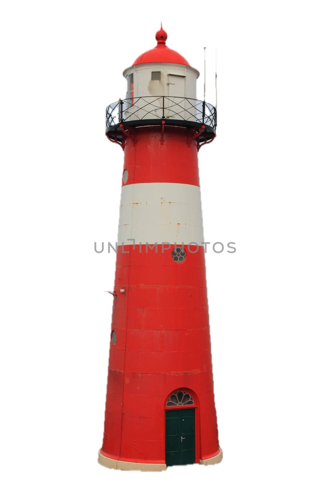 a red lighthouse with blue sky in the background