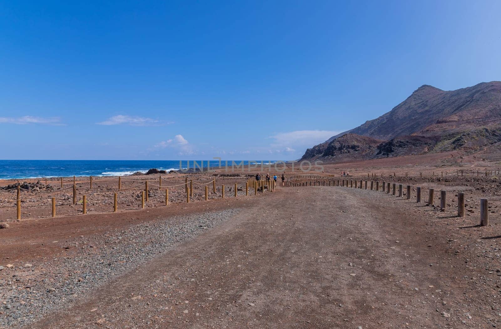 Gran Canaria, Spain: March 3, 2024: People at el Confital beach on the edge of Las Palmas, La Isleta peninsula. Gran Canaria, Spain