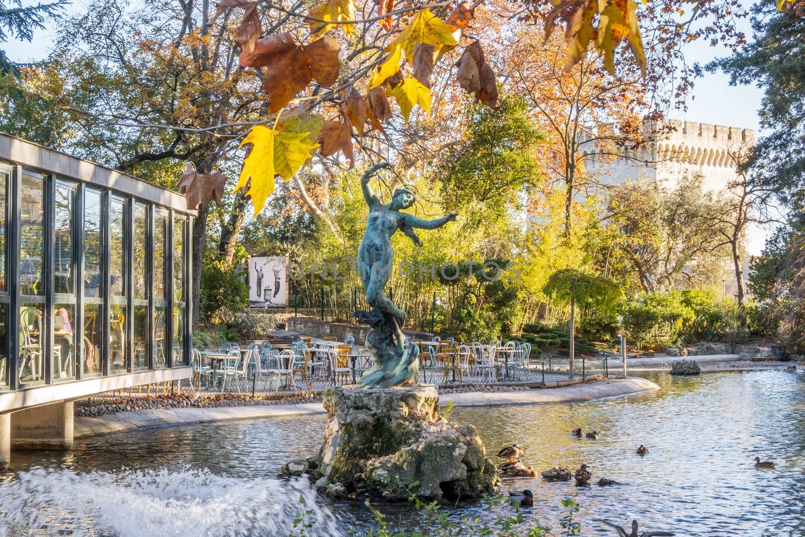 Avignon, France - November 25, 2023: Pond and statue in the garden of the Rocher des Doms, city of Avignon, department of Vaucluse, France