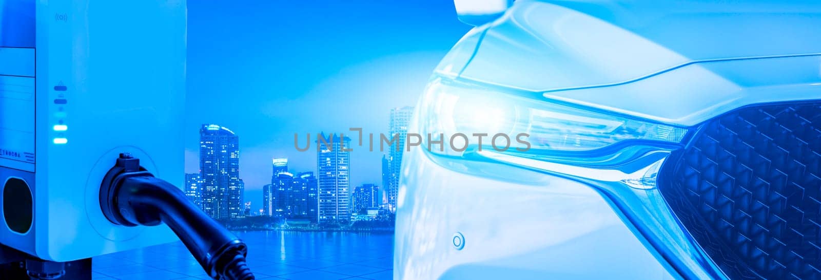 Electric car. Smart city electric vehicle charging infrastructure. Futuristic autonomous cars. Self-driving technology at charging stations. Future of urban mobility and sustainable transport.