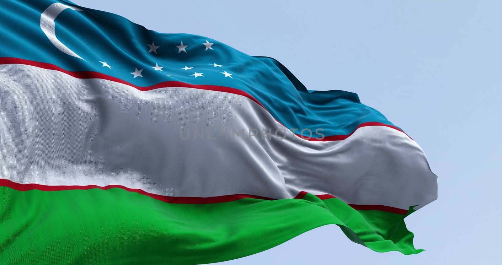 Close-up of Uzbekistan national flag waving on a clear day. Sovereign country in Central Asia. 3d illustration render. Rippling fabric. Selective focus.