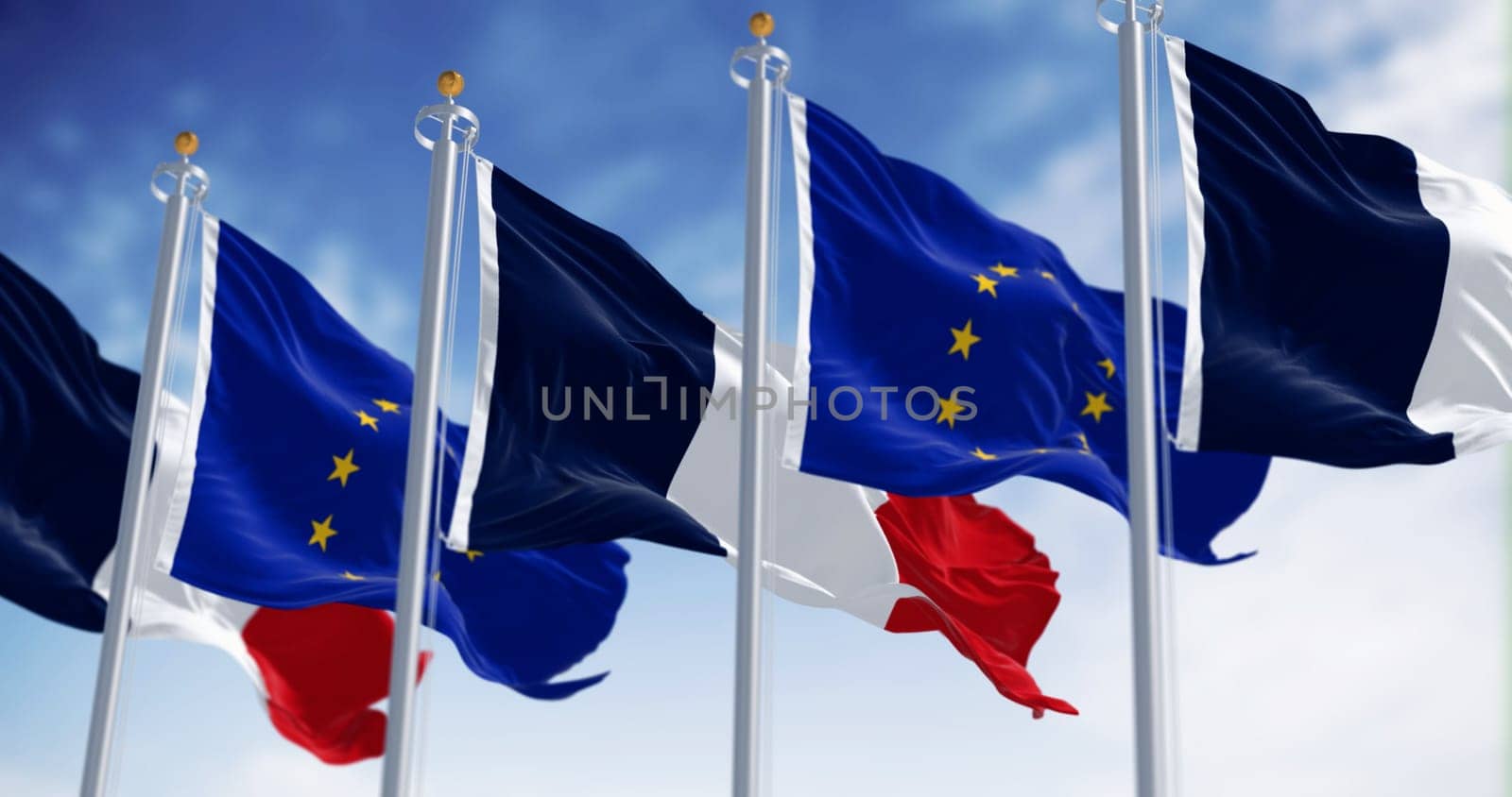 Close-up of France flag and European Union waving on a clear day. France became a member of the European Union on January 1, 1958. 3d illustration render. Selective focus. Fluttering fabric