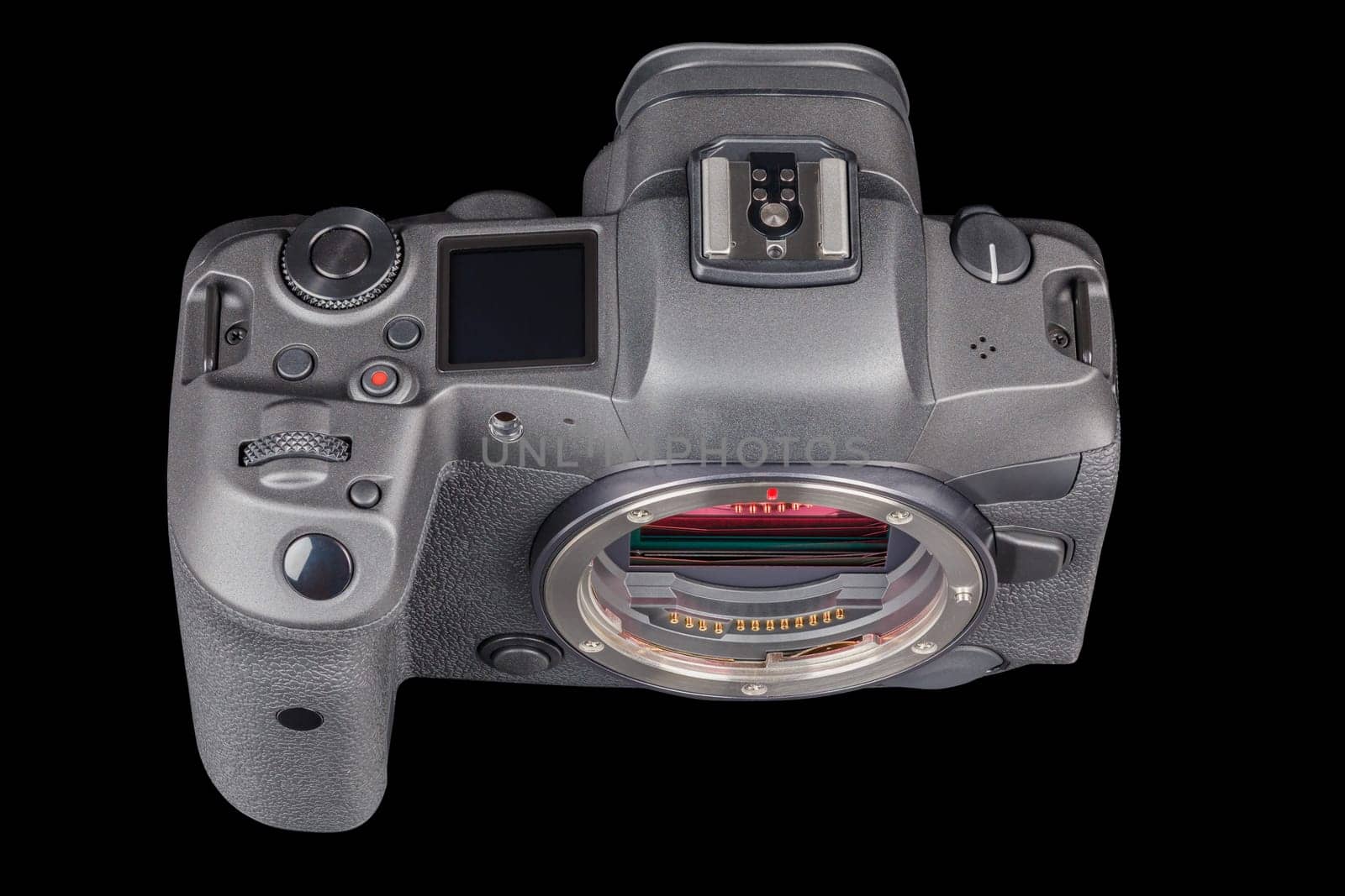 black 2020s professional 35mm full-frame mirrorless camera body with flip screen isolated on black background.