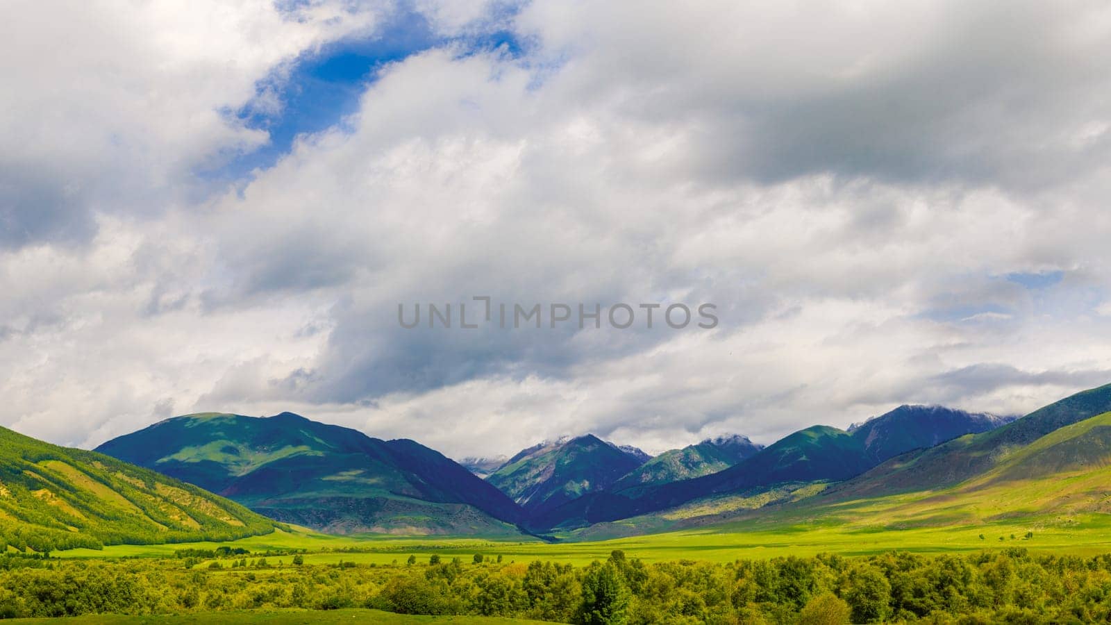panorama of Semenovskoye gorge in Kyrgyzstan at cloudy summer day.
