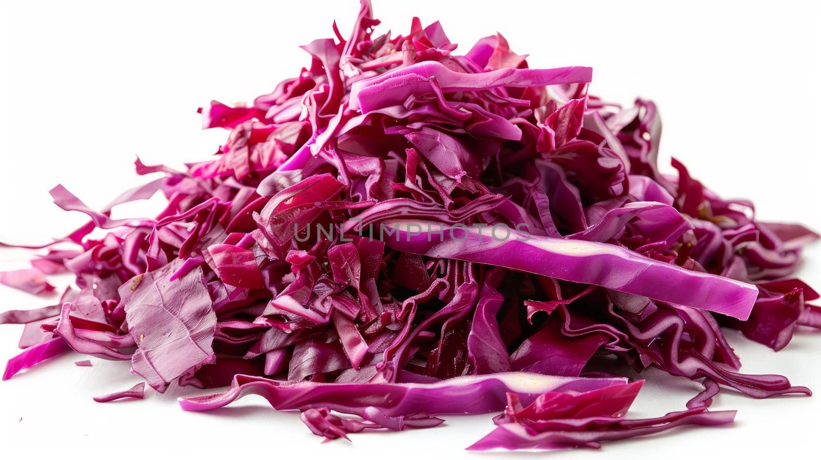 Pile of shredded red cabbage on a white background .