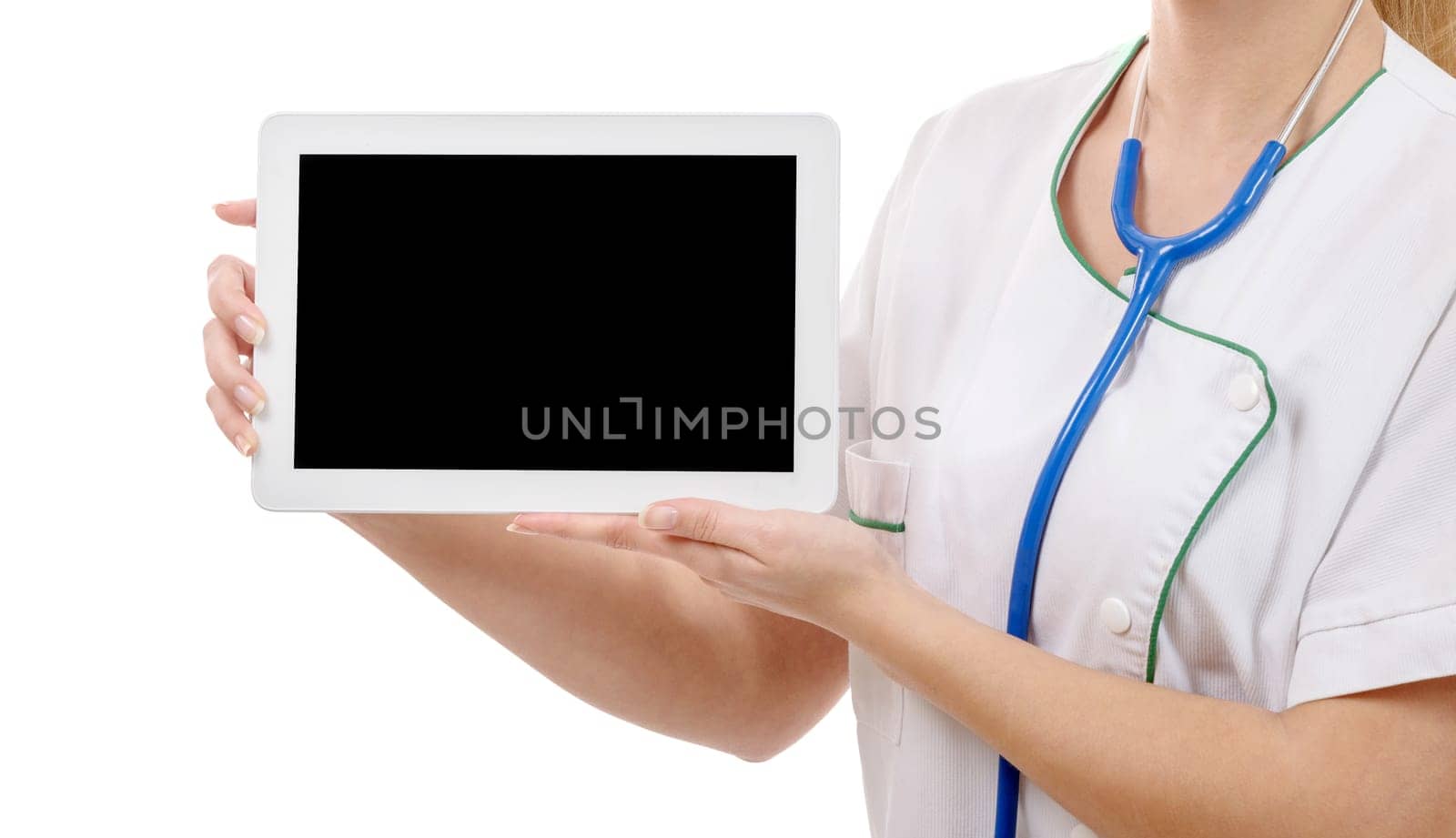 a young cheerful woman doctor is showing her blank tablet, isolated over white