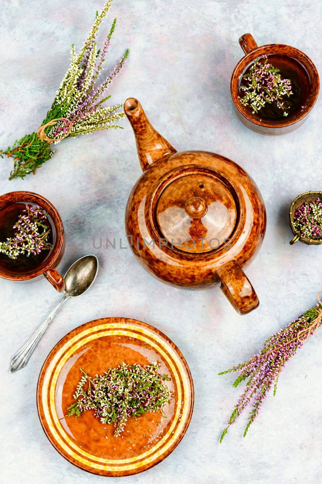 Natural herbal tea made from fresh heather. Alternative medicine and naturopathy concept.