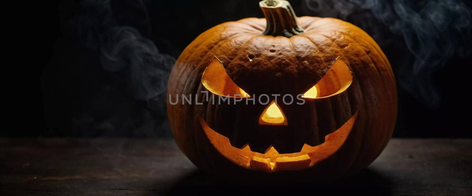 A carved Halloween pumpkin features a menacing face illuminated from within, with smoke curling upward, enhancing the haunting ambiance of the evening. Generative AI.