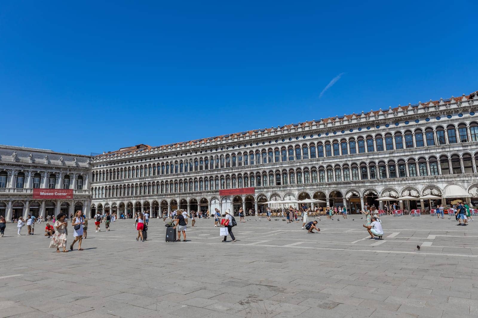 Venice, Italy - July 26, 2024: Tourist on San Marco square. Venice is very popular tourist destination. Venice, Italy