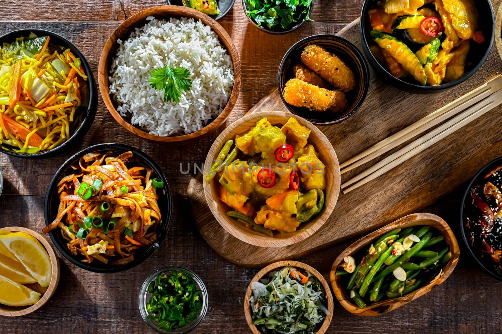 Composition with variety of east asian dishes.
