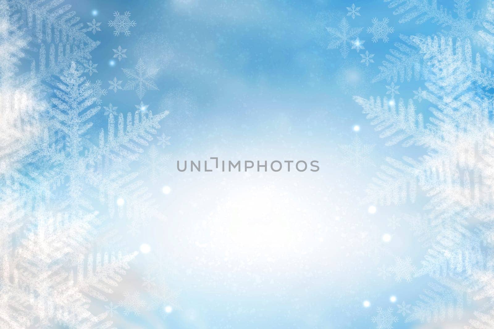Abstract blurred festive winter christmas background texture with shiny blue and yellow white bokeh lighted snow landscape with stars and blue sky.