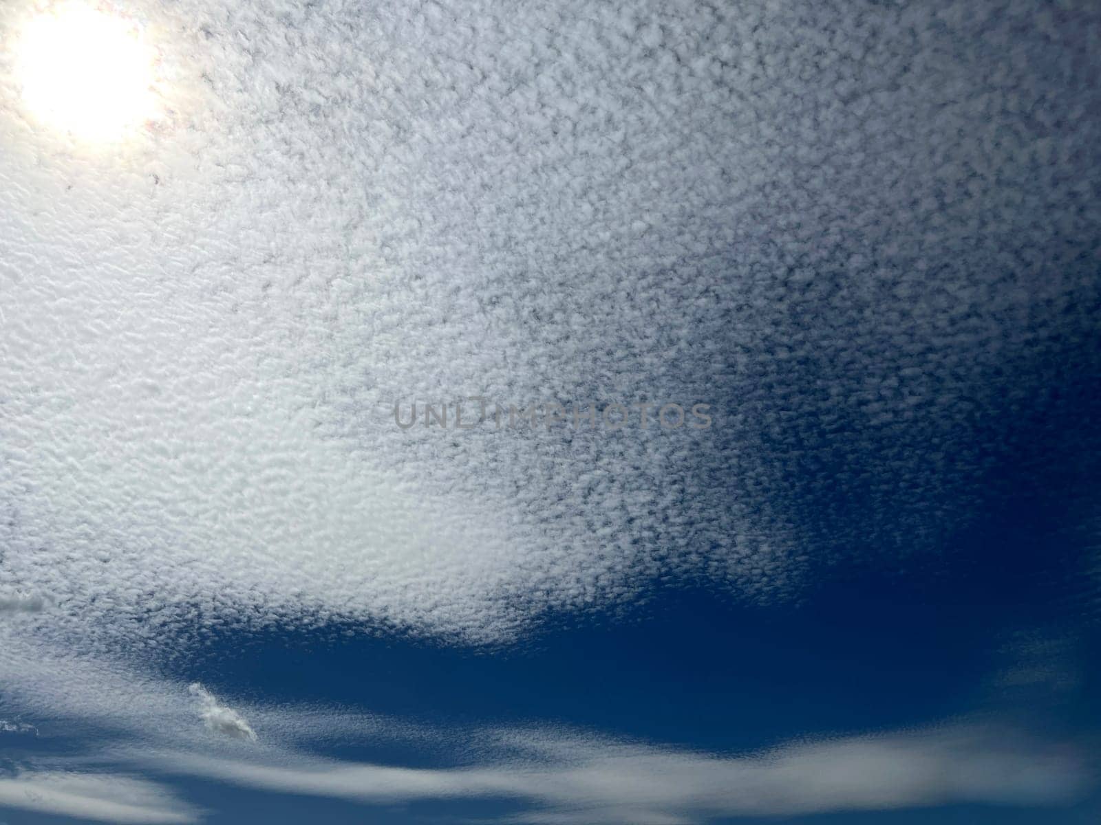 Fleecy clouds,Cirrocumulus undulatus,herald rain