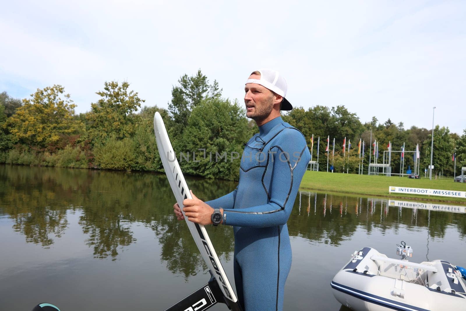 Kitsurfer Ben Beholz gives taster courses on the Messesee and does show acts in pump and wingfoiling  The 63rd Interboot 2024 trade fair in Friedrichshafen has opened