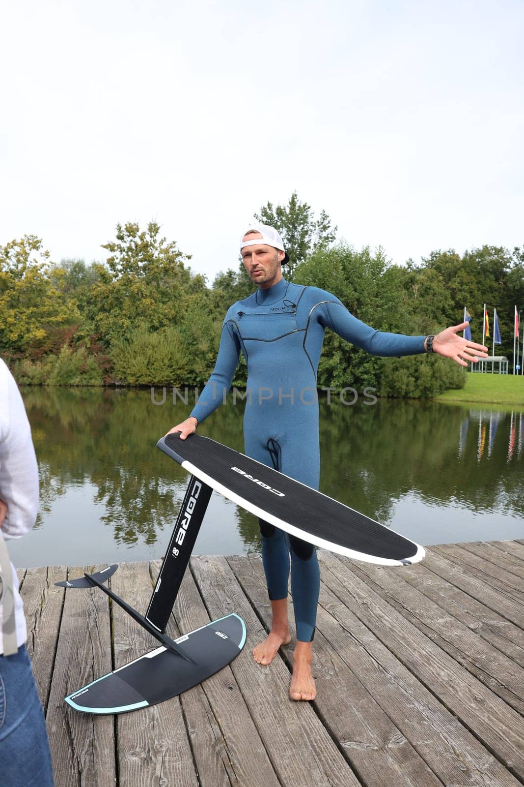 Kitsurfer Ben Beholz gives taster courses on the Messesee and does show acts in pump and wingfoiling  The 63rd Interboot 2024 trade fair in Friedrichshafen has opened