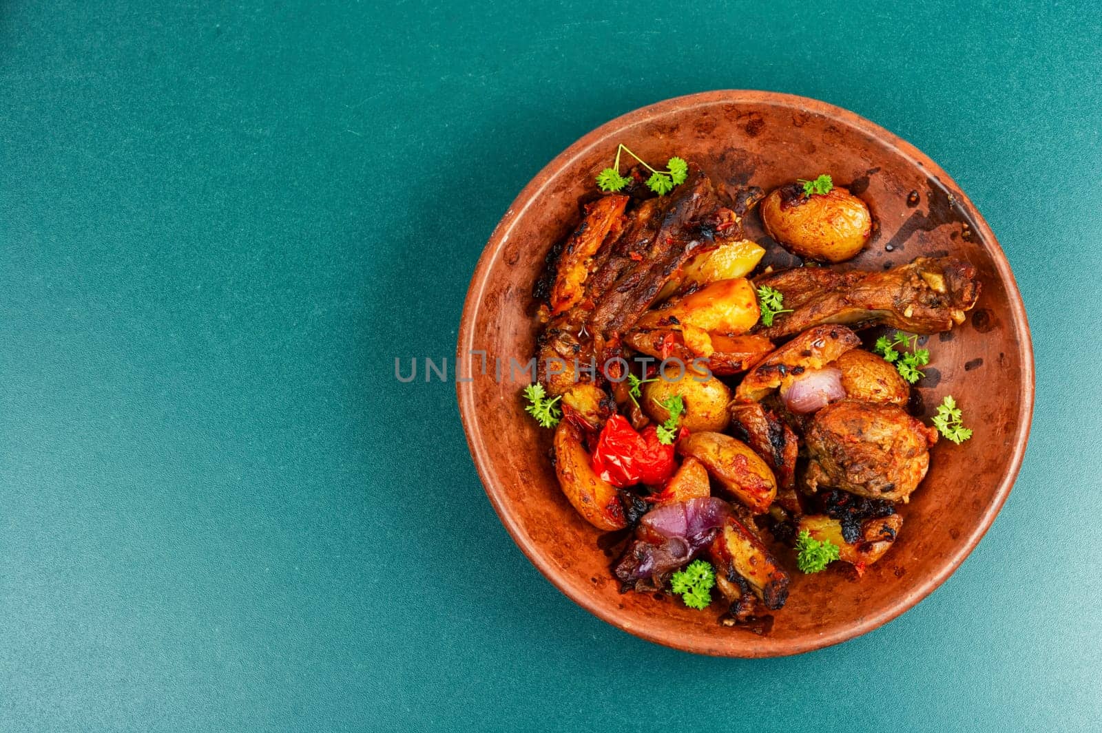 Spare ribs or grilled ribs with stewed vegetables. Barbecue ribs.