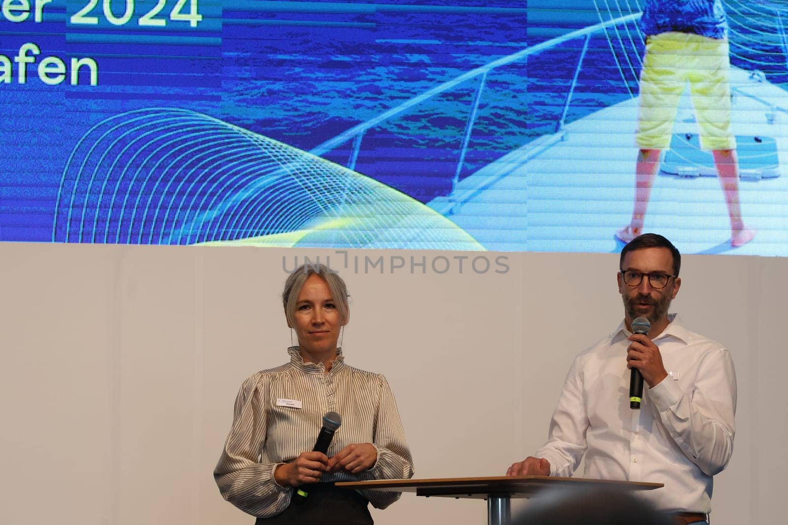 Mirja Raff (deputy. Press Officer) and Felix Klarmann,Project Manager of the Interboot 2024 trade fair in Friedrichshafen during the welcome address