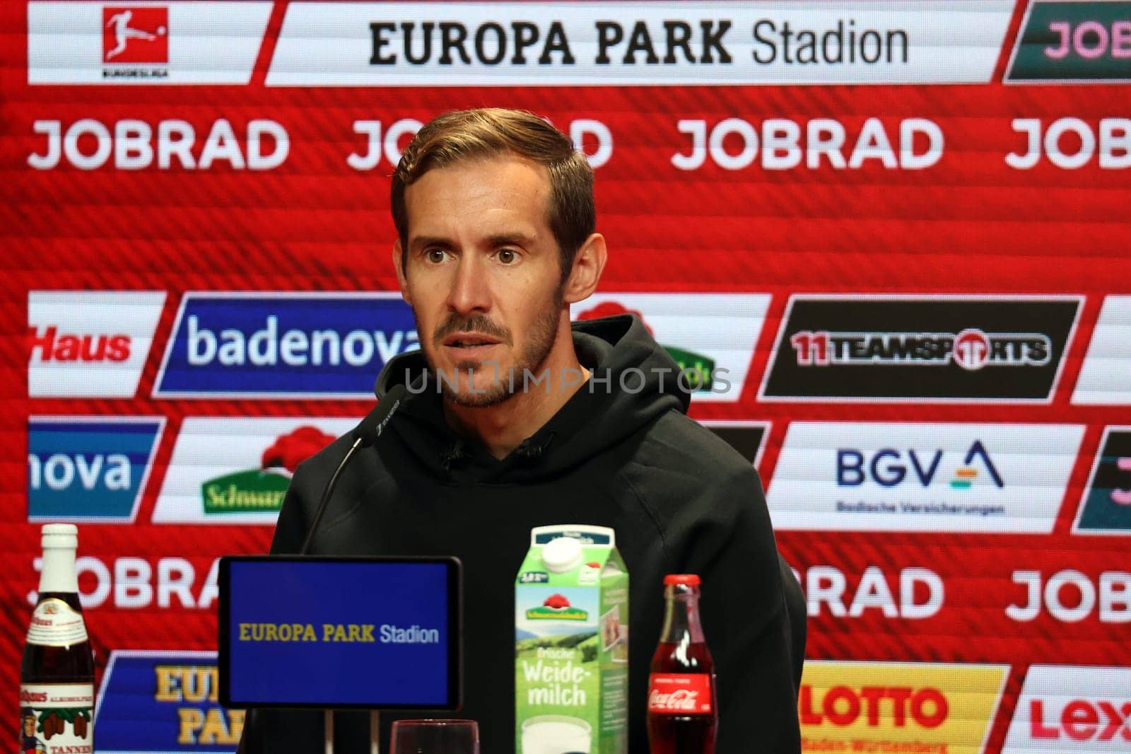 Head coach Julian Schuster (SC Freiburg) at the press conference,PK after the match of the 1st FBL: 24-25: 1st FBL: 24-25: 5th Sptg. SC Freiburg - FC St. Pauli  DFL REGULATIONS PROHIBIT ANY USE OF PHOTOGRAPHS AS IMAGE SEQUENCES AND/OR QUASI-VIDEONann  Photo: Joachim Hahne/johapress