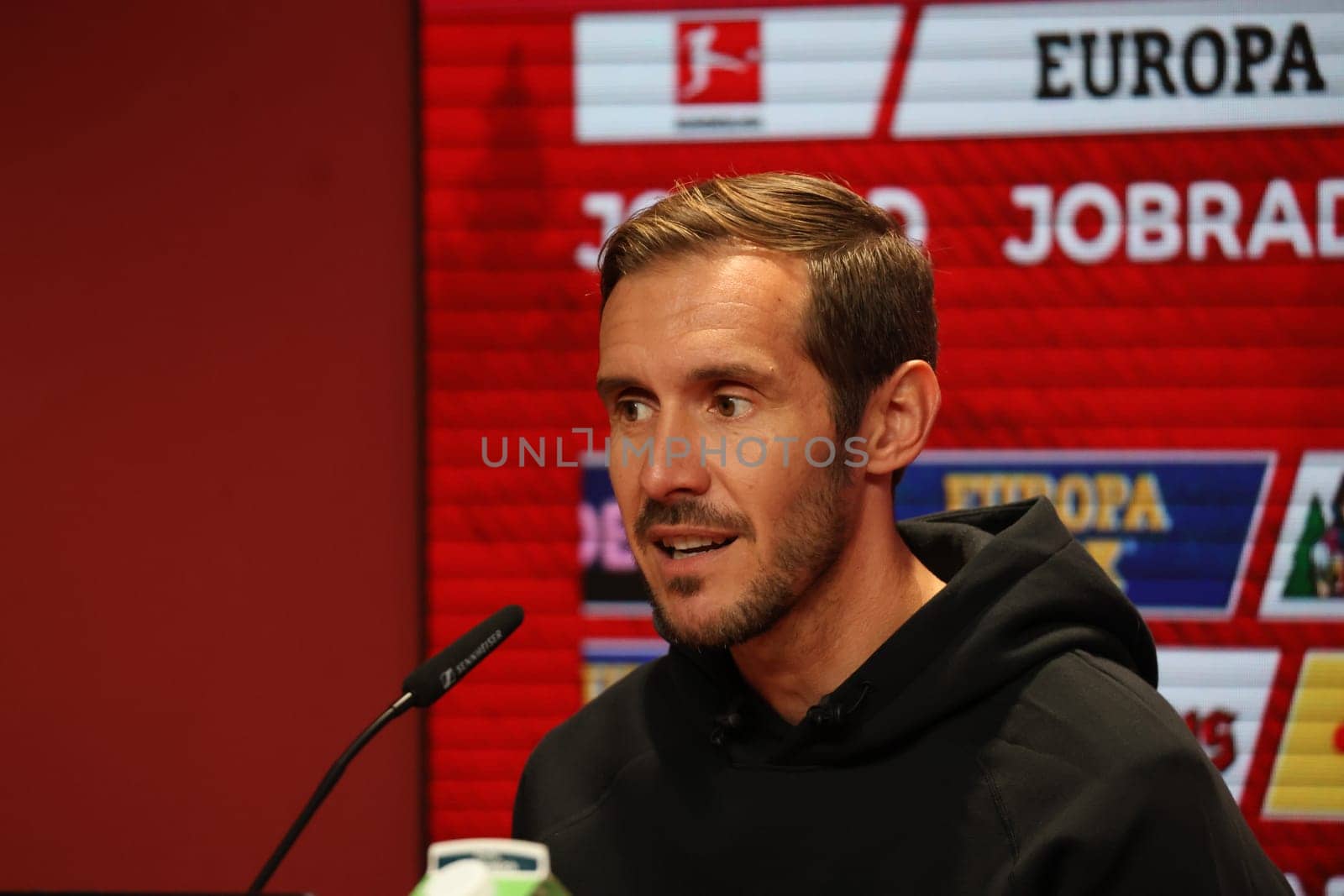 Head coach Julian Schuster (SC Freiburg) at the press conference,PK after the match of the 1st FBL: 24-25: 1st FBL: 24-25: 5th Sptg. SC Freiburg - FC St. Pauli  DFL REGULATIONS PROHIBIT ANY USE OF PHOTOGRAPHS AS IMAGE SEQUENCES AND/OR QUASI-VIDEONann  Photo: Joachim Hahne/johapress