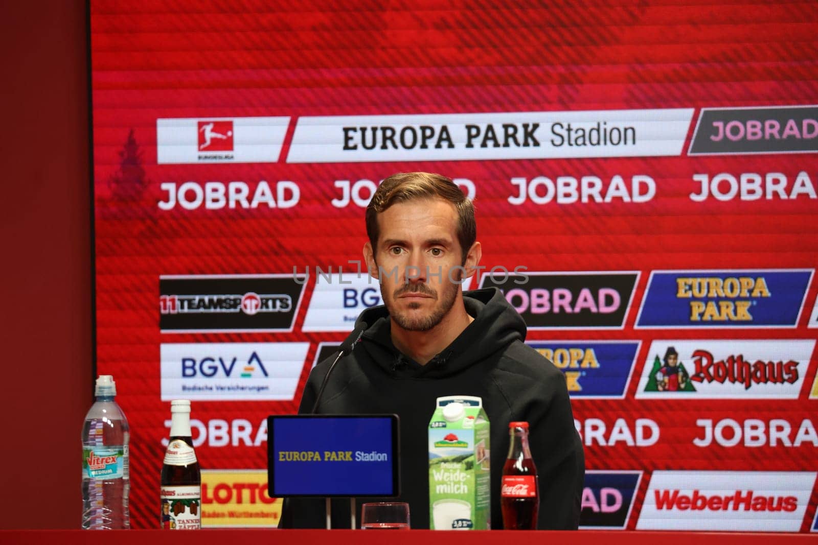 Head coach Julian Schuster (SC Freiburg) at the press conference,PK after the match of the 1st FBL: 24-25: 1st FBL: 24-25: 5th Sptg. SC Freiburg - FC St. Pauli  DFL REGULATIONS PROHIBIT ANY USE OF PHOTOGRAPHS AS IMAGE SEQUENCES AND/OR QUASI-VIDEONann  Photo: Joachim Hahne/johapress