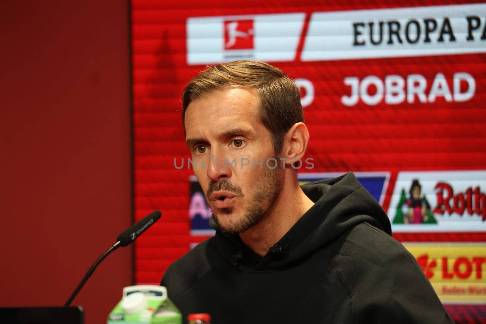Head coach Julian Schuster (SC Freiburg) at the press conference,PK after the match of the 1st FBL: 24-25: 1st FBL: 24-25: 5th Sptg. SC Freiburg - FC St. Pauli  DFL REGULATIONS PROHIBIT ANY USE OF PHOTOGRAPHS AS IMAGE SEQUENCES AND/OR QUASI-VIDEONann  Photo: Joachim Hahne/johapress