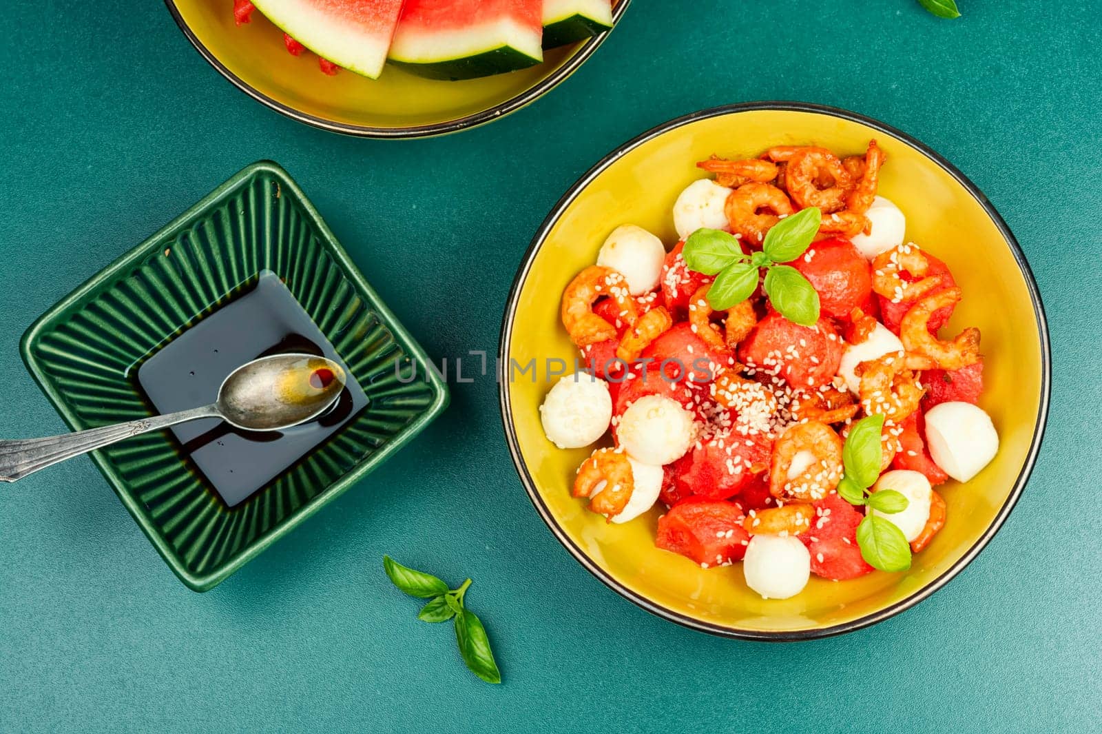Summer salad with watermelon, mozzarella cheese and shrimp.
