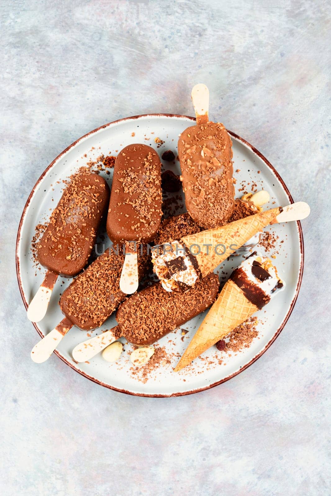 Ice cream with chocolate on a stick. Chocolate popsicles.