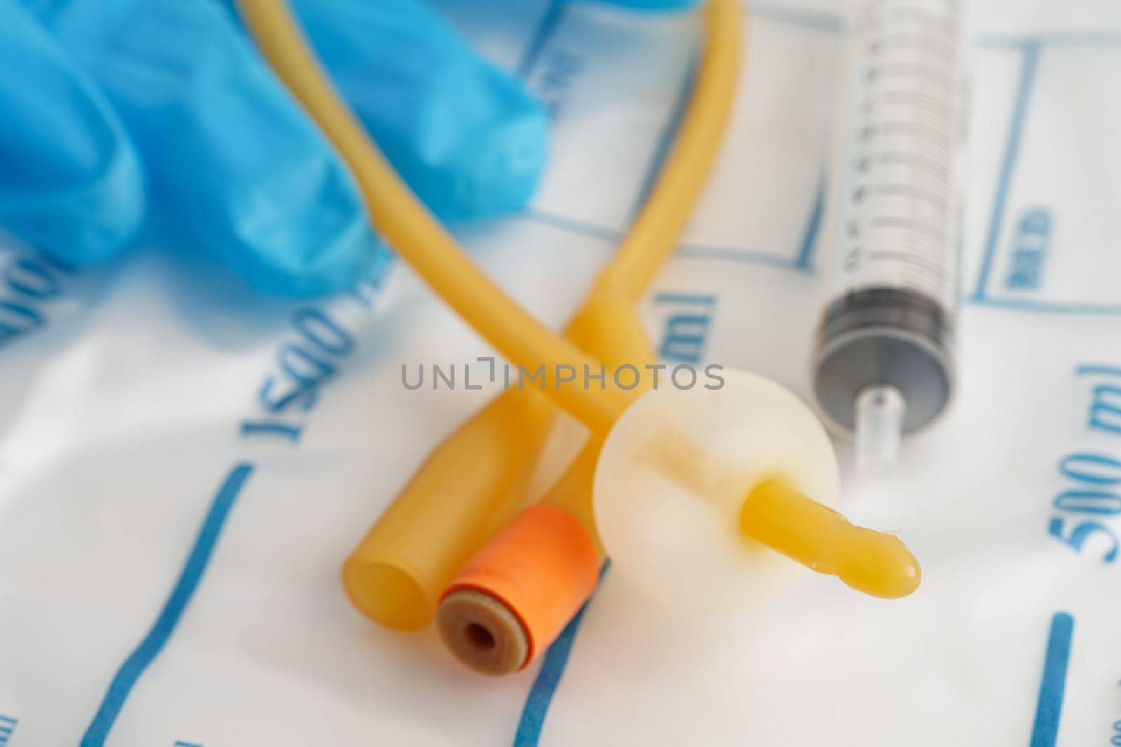 Foley catheter and urine drainage bag collect urine for disability or patient in hospital.