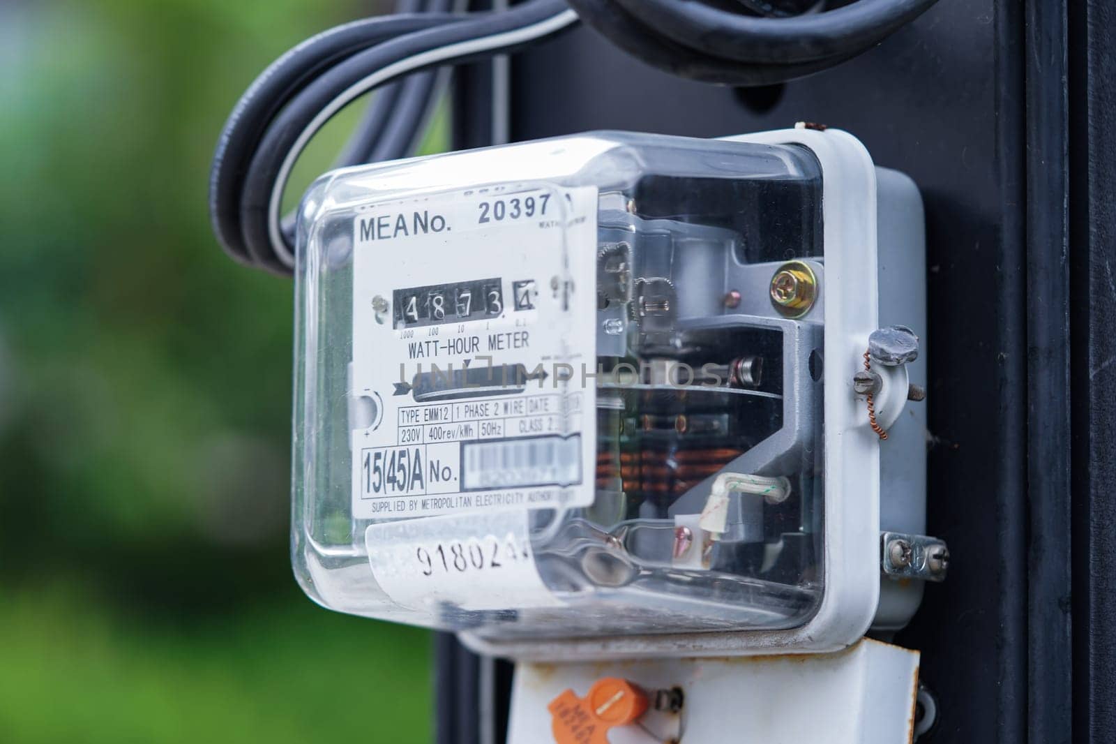 Electric measuring power meter for energy cost at home and office.