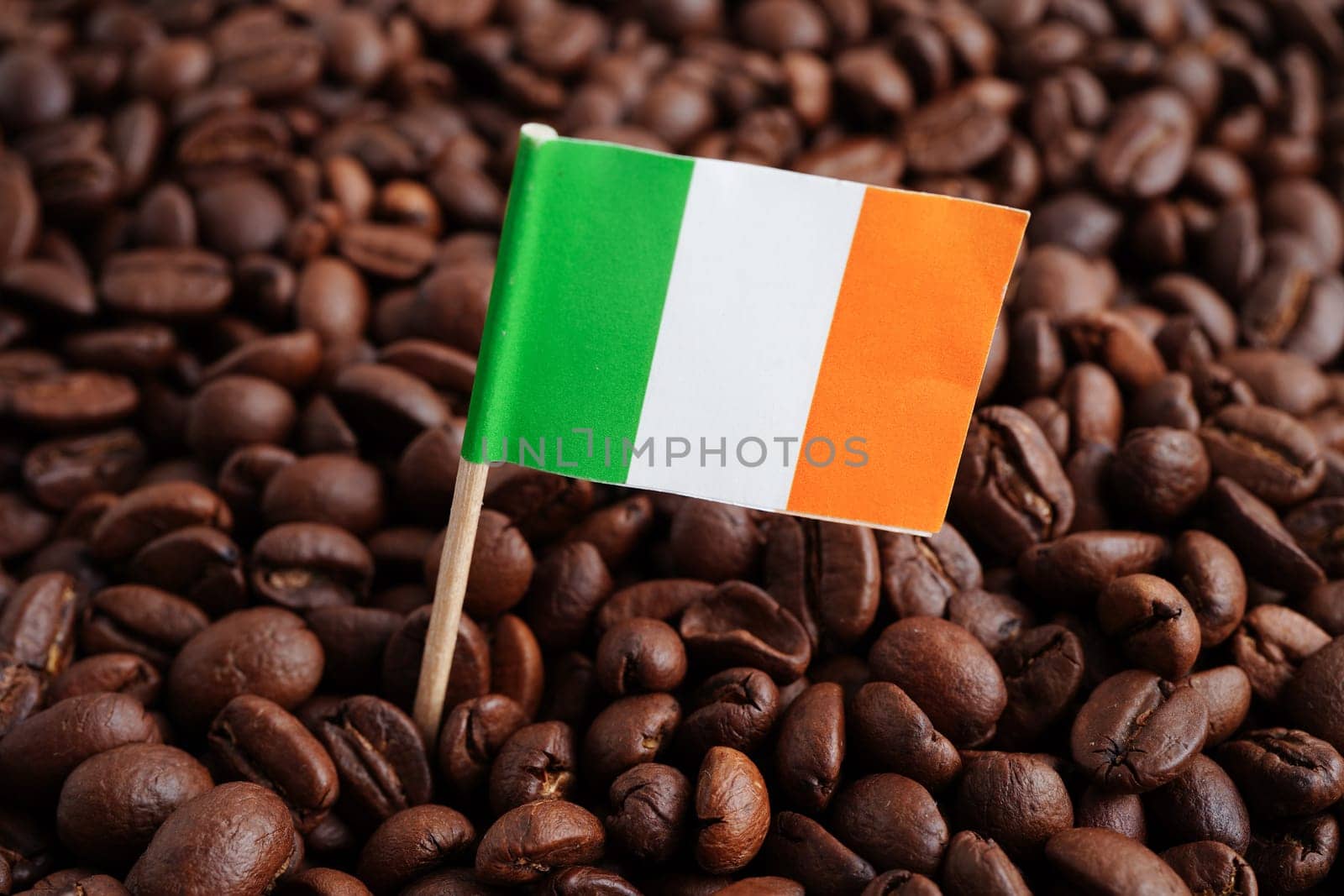 Ireland flag on coffee beans, shopping online for export or import food product.