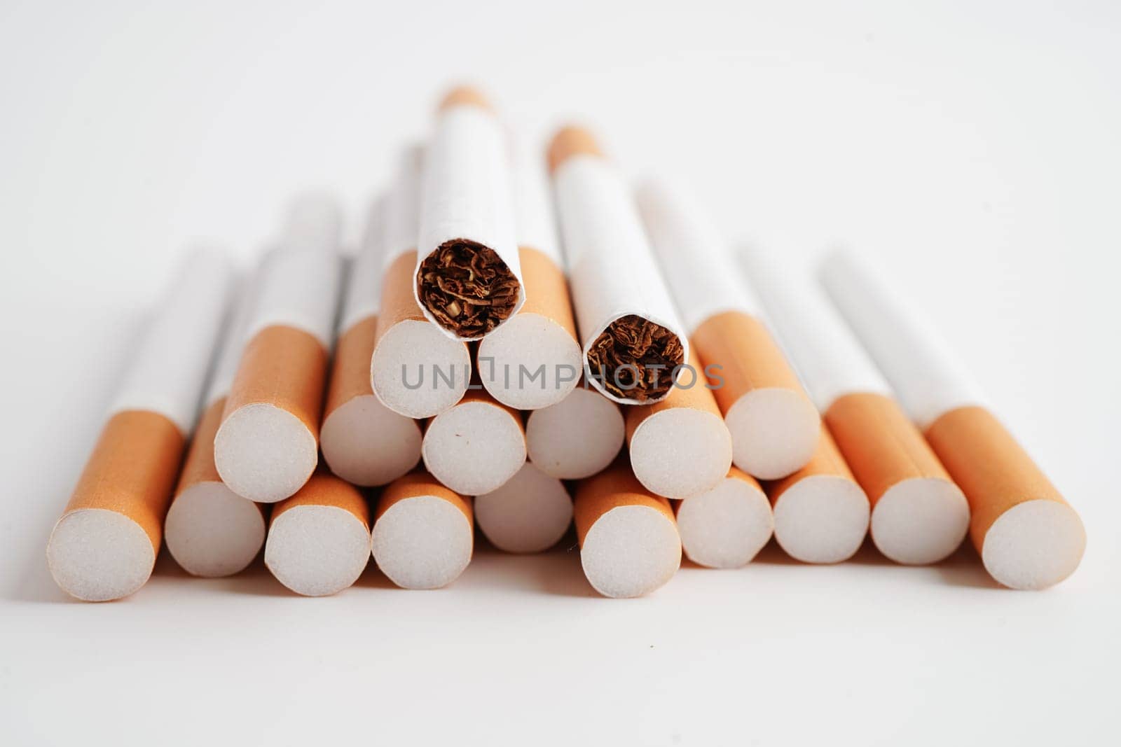Cigarette, roll tobacco in paper with filter tube, No smoking concept.