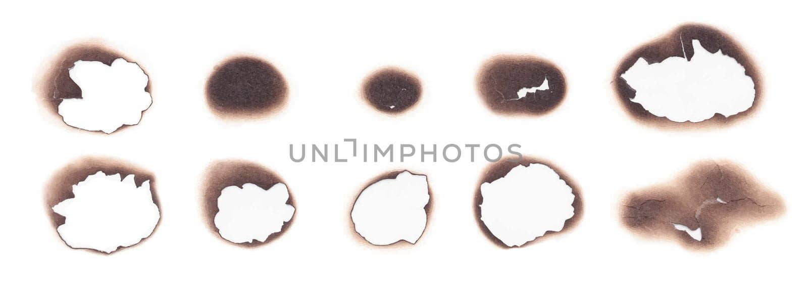 Burnt paper holes realistic vector