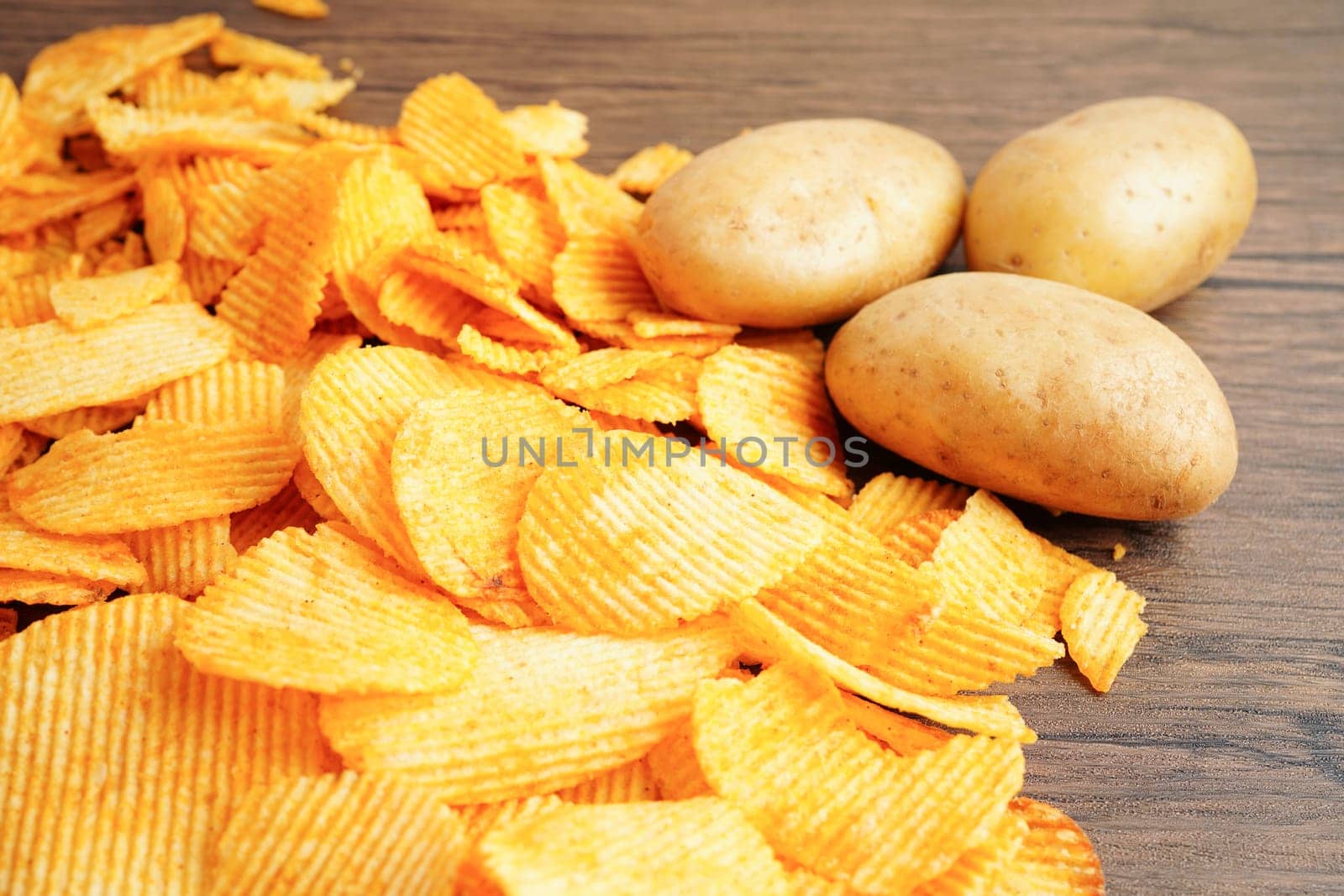 Potato chips , delicious BBQ seasoning spicy for crips, thin slice deep fried snack fast food.