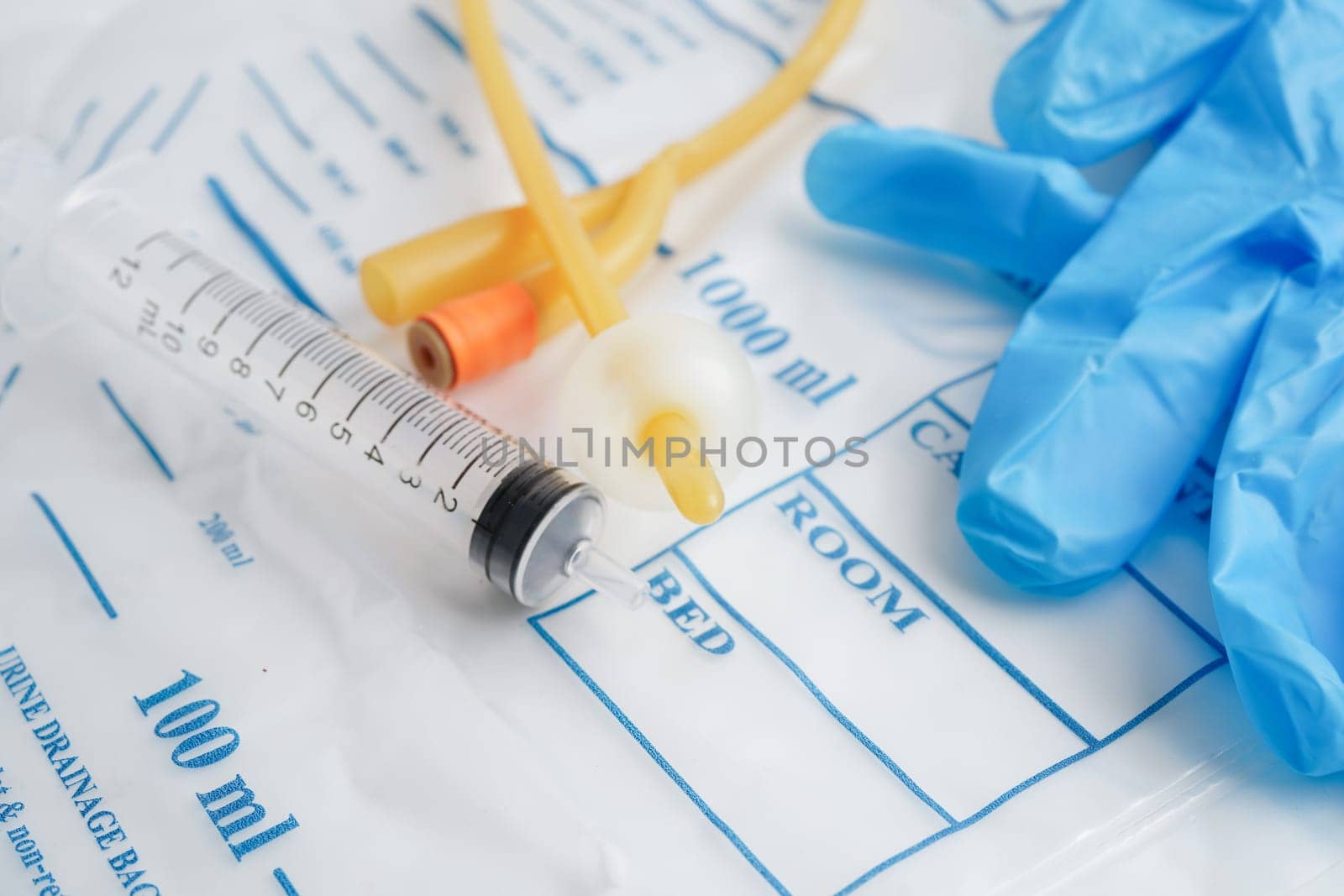 Foley catheter and urine drainage bag collect urine for disability or patient in hospital.