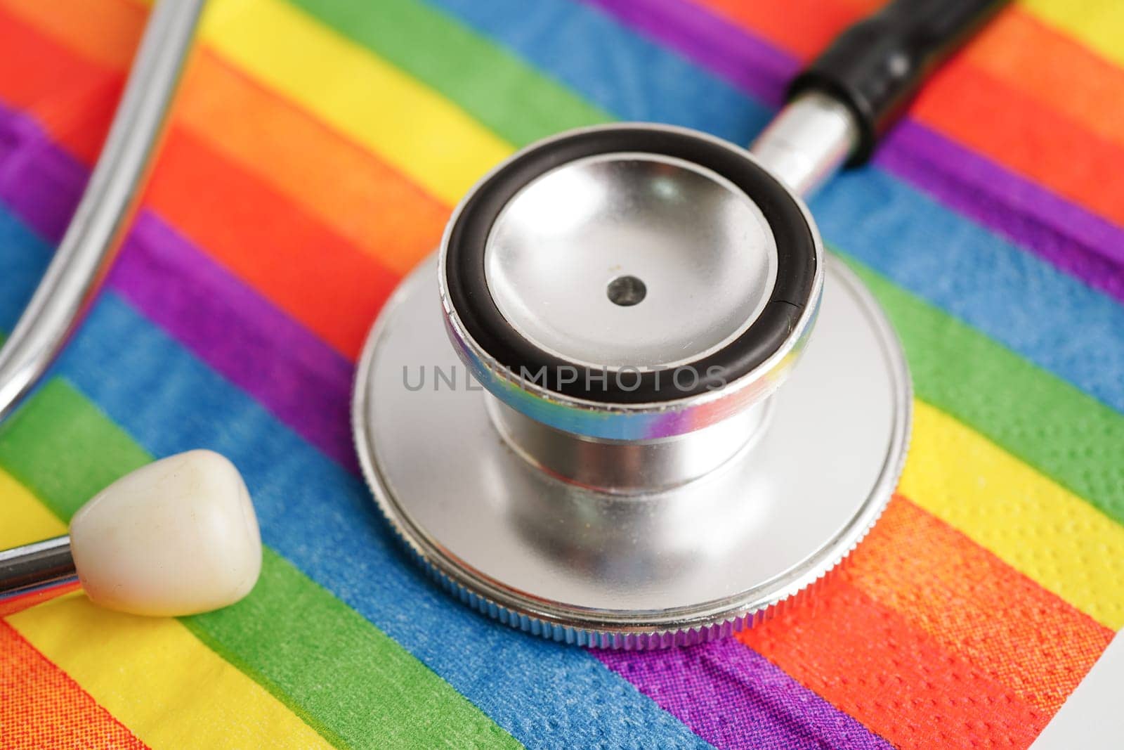 LGBT symbol, Stethoscope on rainbow flag, rights and gender equality, LGBT Pride Month in June.