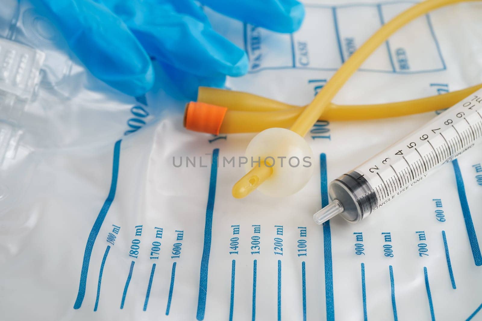 Foley catheter and urine drainage bag collect urine for disability or patient in hospital.