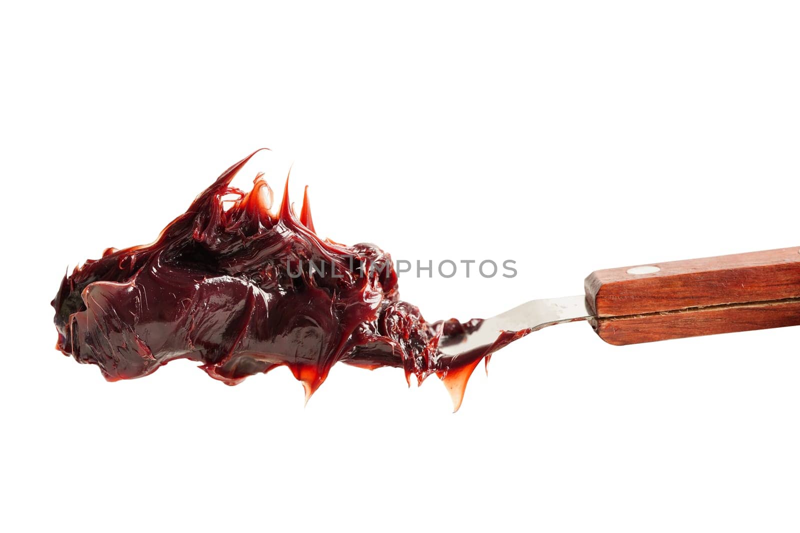Grease isolated on white background with clipping path, red excellent water resistance synthetic lithium complex.