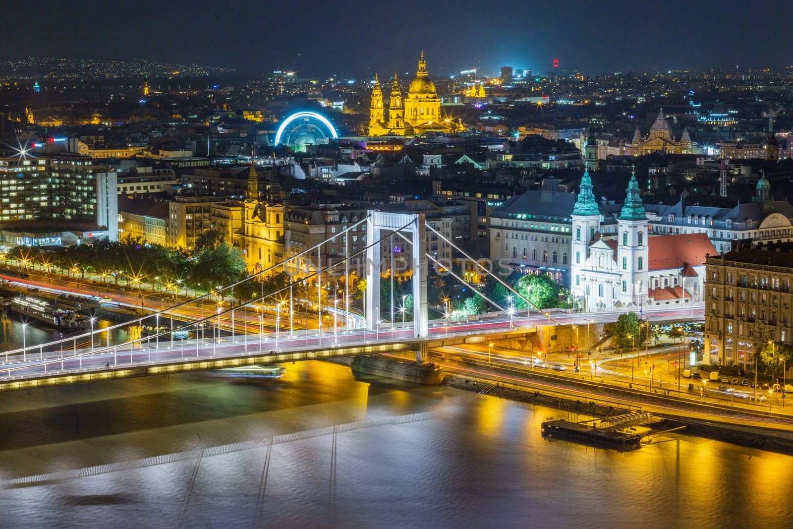 Aerial night vision  of the illuminated Budapest by night in the autumn season, Hungary