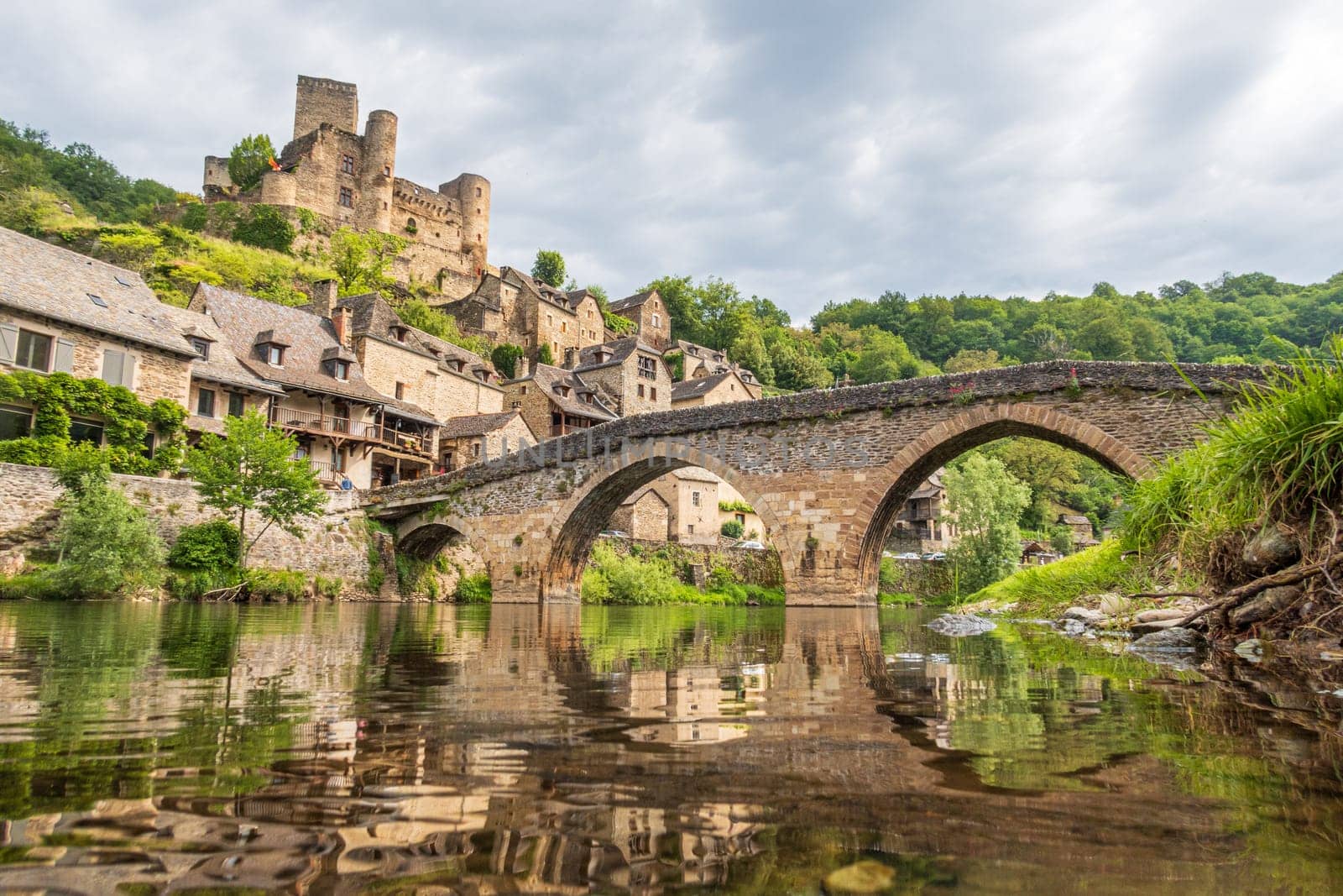 Belcastel village, castle and medieval bridge over Aveyron river, one of the most beautiful villages of France photographed in Occitanie region