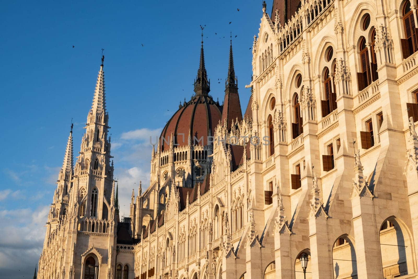 Detail of the parliament building, towers and dome, in Budapest, Hungary