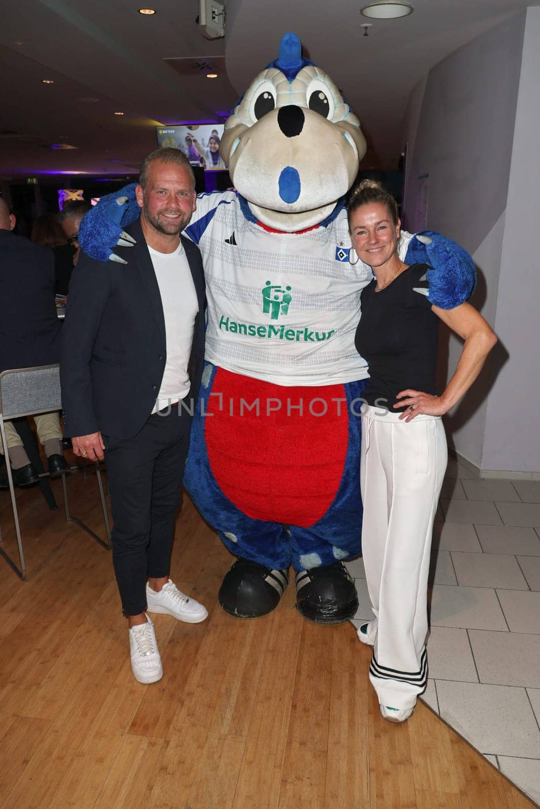 Jörg Vennewald,Dino,Rhea Harder,Sport Quiz Charity gala in favor of the Right to Play in the VIP area of the Volksparkstadion,Hamburg,24.09.2024