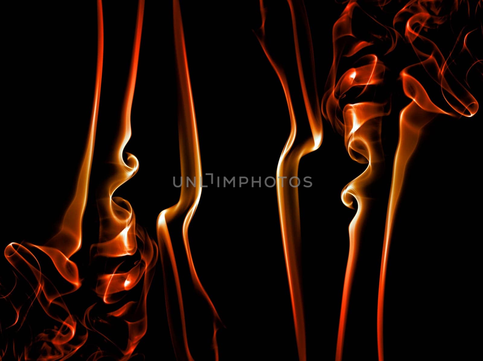 abstract colored smoke on a black background