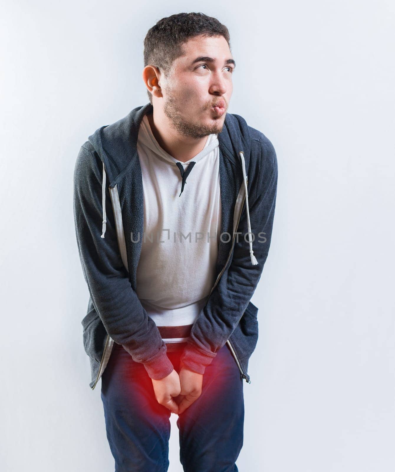 Person with cystitis and urinary problems isolated. Young man with urinary incontinence isolated