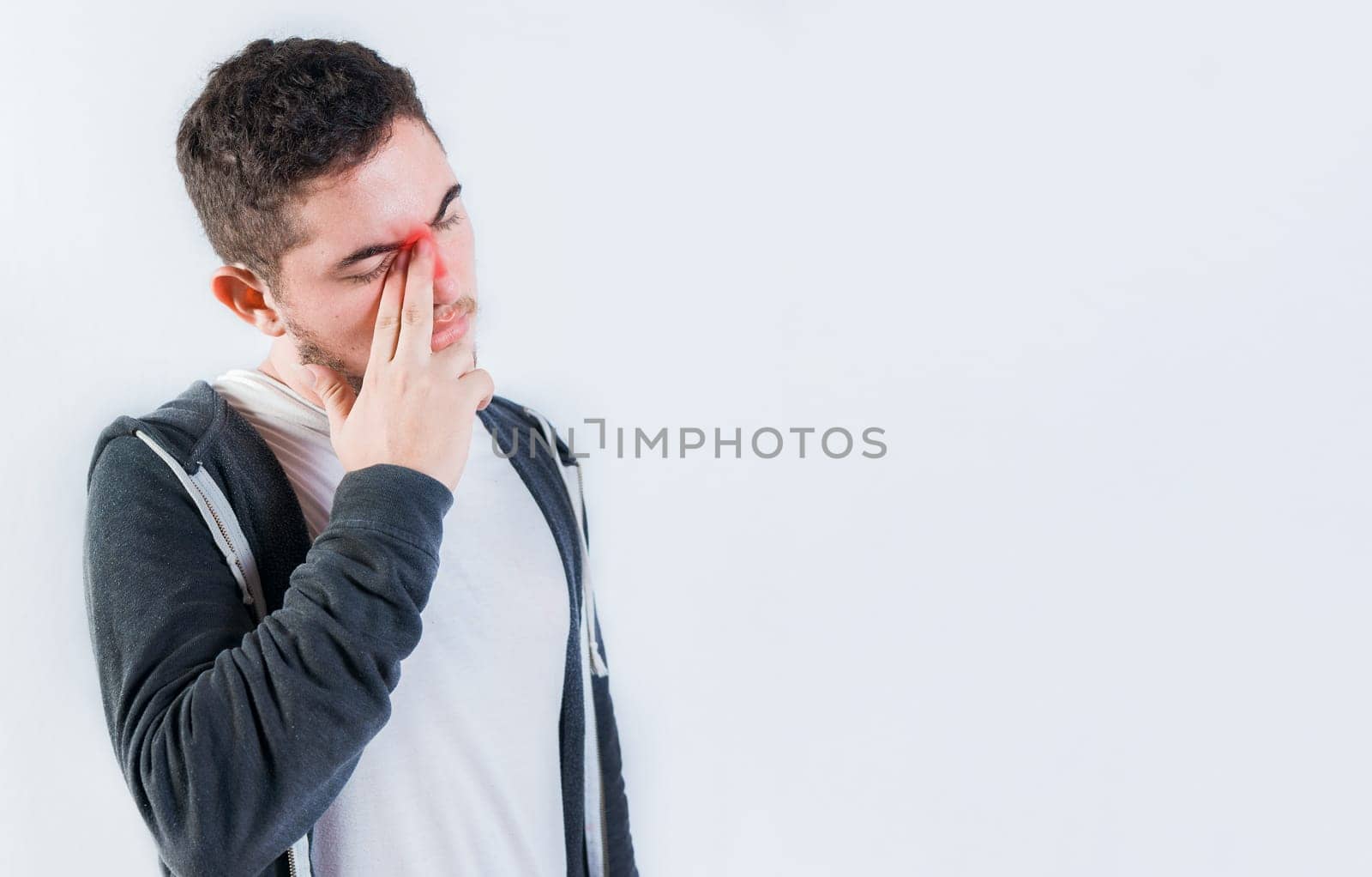 Man with nasal congestion isolated. Person with sinusitis and nasal inflammation
