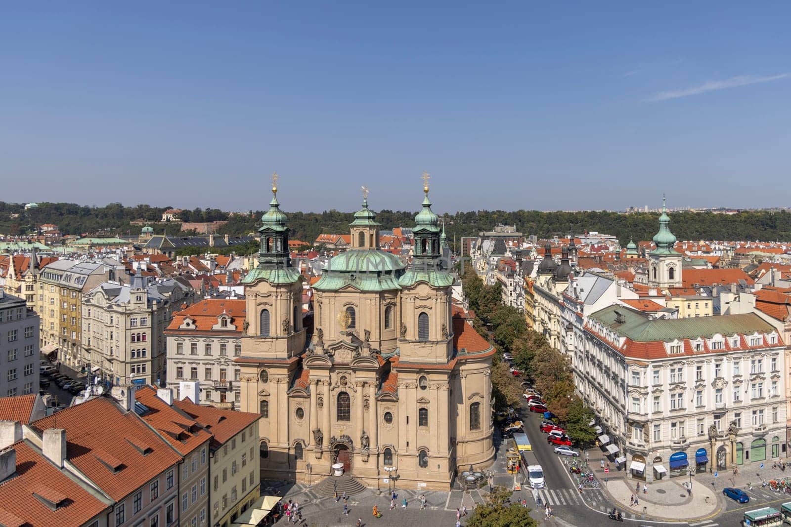 Prague, Czech Republic - September 4, 2024: Aerial view from tower of Town Hall of city with St. Nicholas Church