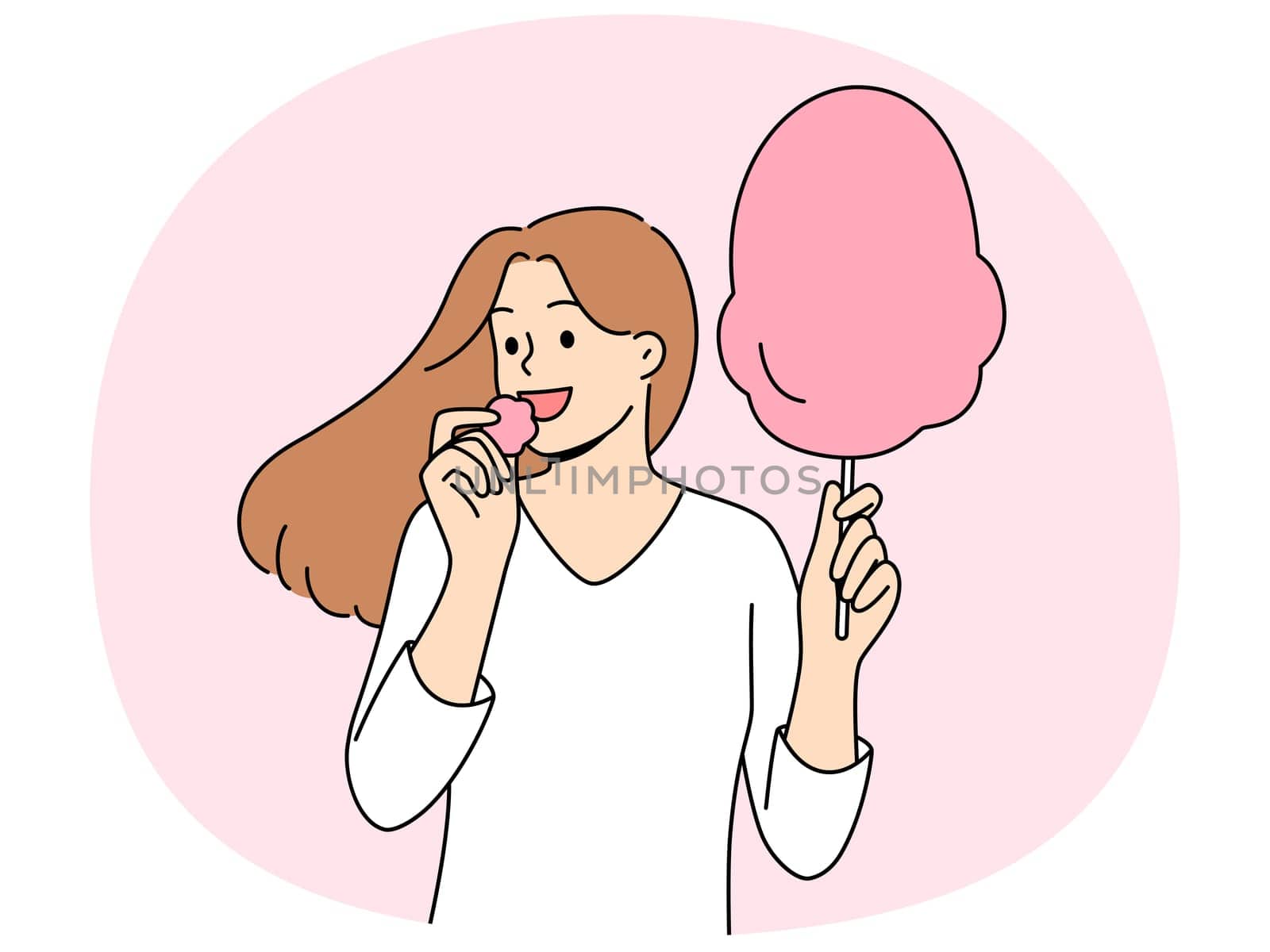 Woman eats cotton candy, enjoying airy sugar dessert while walking in park or at fair. Carefree girl holding cotton candy and experiencing positive emotions from lack of important things to do