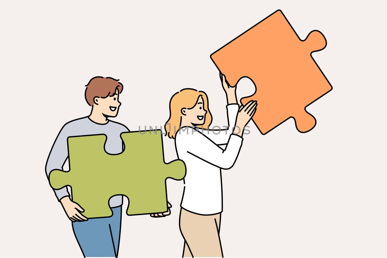 Couple of man and woman are working on building relationships, holding puzzle pieces in hands