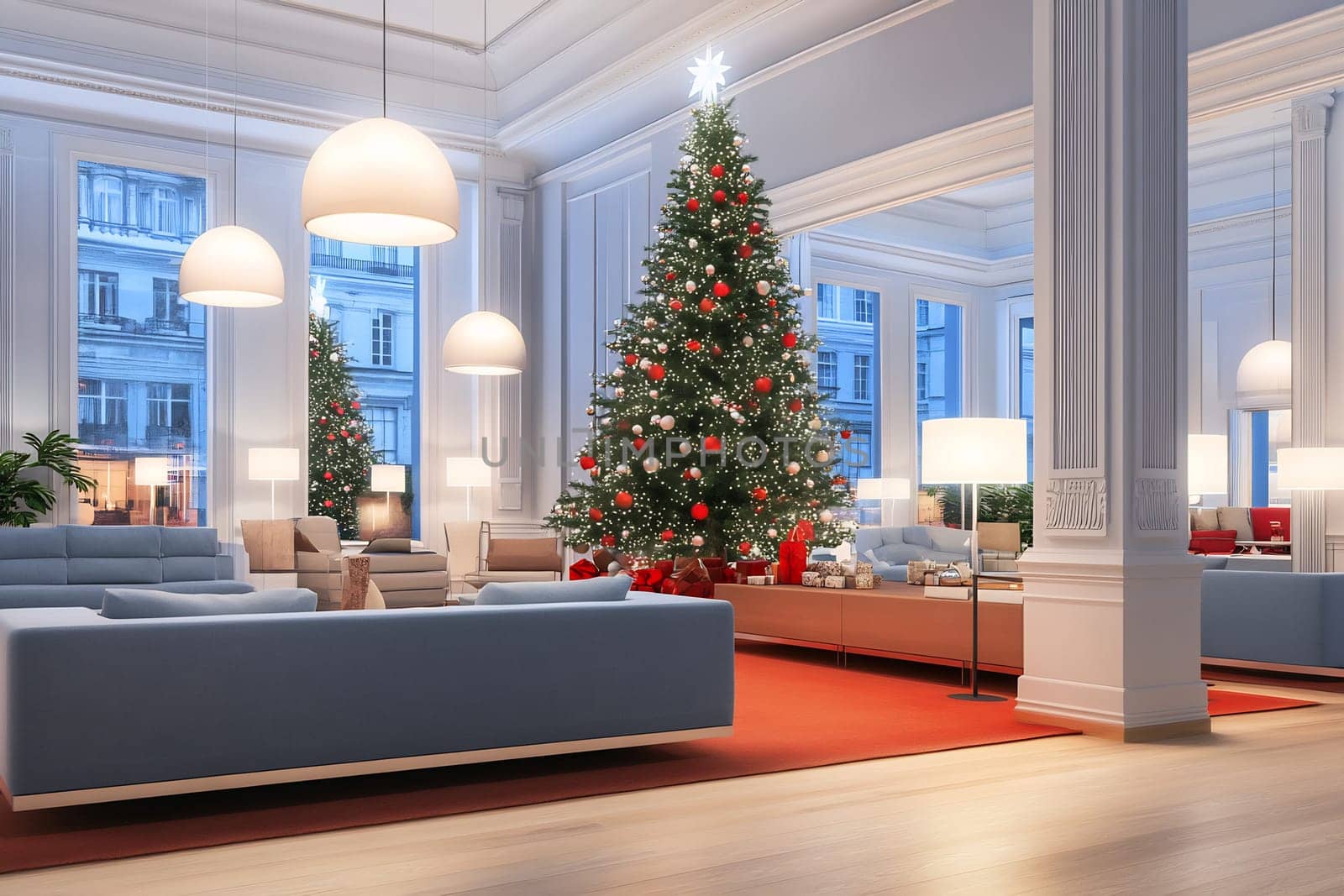 A warm and inviting lobby showcases a large Christmas tree adorned with lights and ornaments, enhancing the festive atmosphere.
